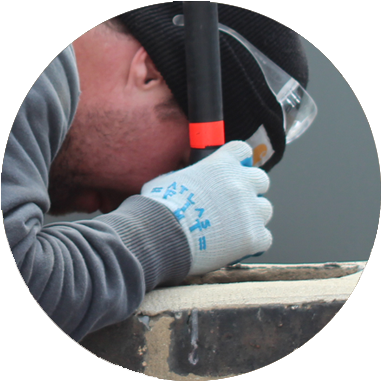 Man inspecting chimney liner