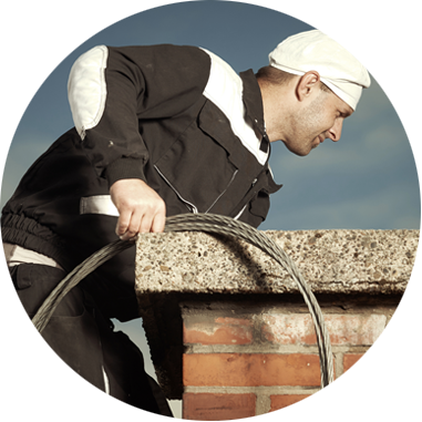 Man fixing a chimney liner